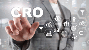 Business professional in a suit pointing at the word “CRO” with hexagonal icons representing analytics, growth, customer targeting, and automation.